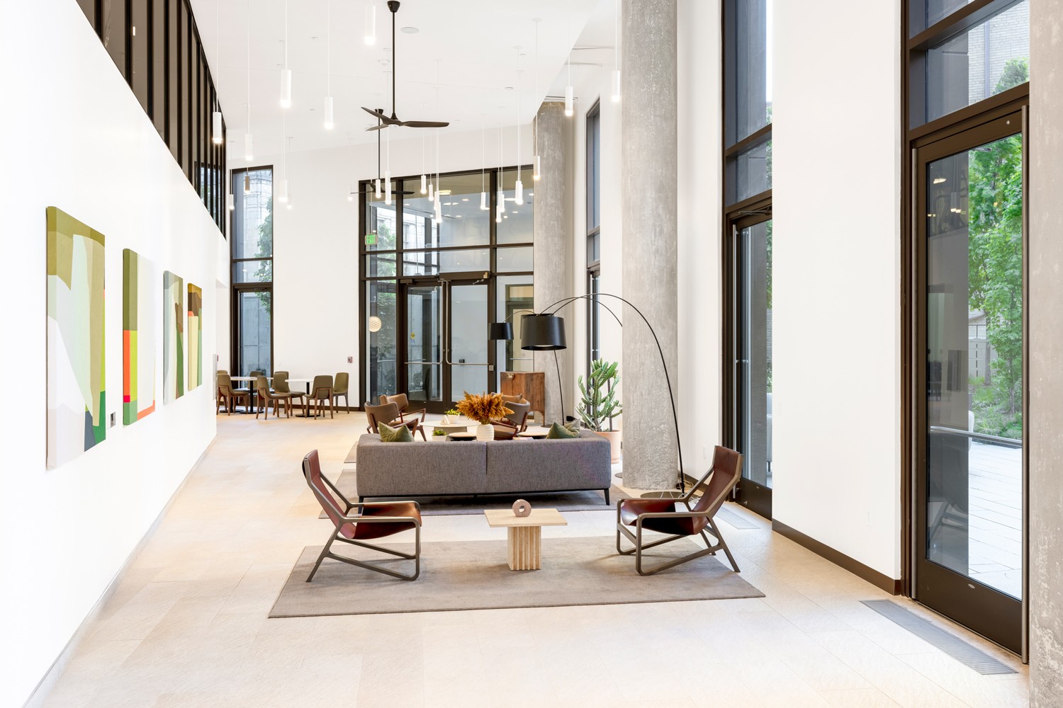 Modern indoor-outdoor lobby with views to the courtyard